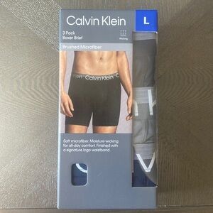 Calvin Klein men’s boxer briefs (box of 3)​